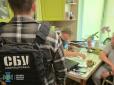 На Київщині працівника заводу підозрюють у тому, що він наводив ракети РФ у п'яти регіонах (фото)